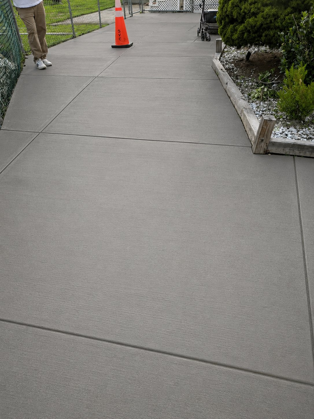 New smooth concrete walkway after replacement
